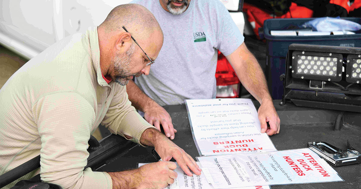 Making signage for hunters. Photo by USDA_WS_KelseyWeir.jpg