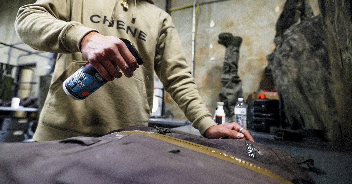 Waterfowl hunter getting waders ready for storing. Photo by Dylan Ferrell_CheneGear.com.jpg
