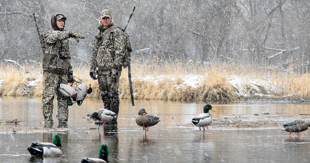 Hunters looking at decoy spread. Photo by DougSteinkePhotos.com